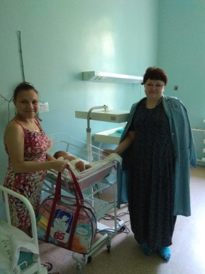 Вручение подарков  новорожденным